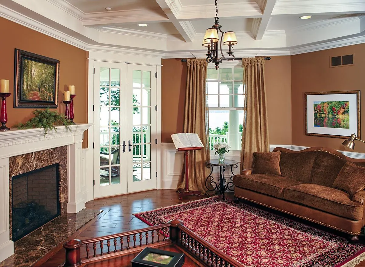 Beautiful white tray ceiling, traditional yet modernized fireplace and two-way entry door.