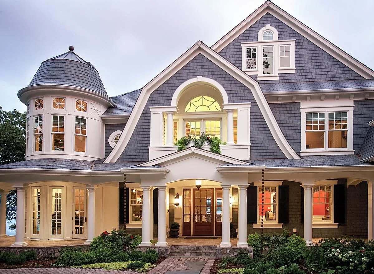 Closer look on the main entryway showing the traditional style of the house.