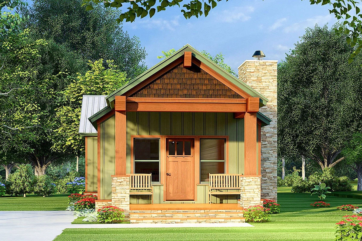 A welcoming front porch complete with wooden benches and a sturdy wood entry door.