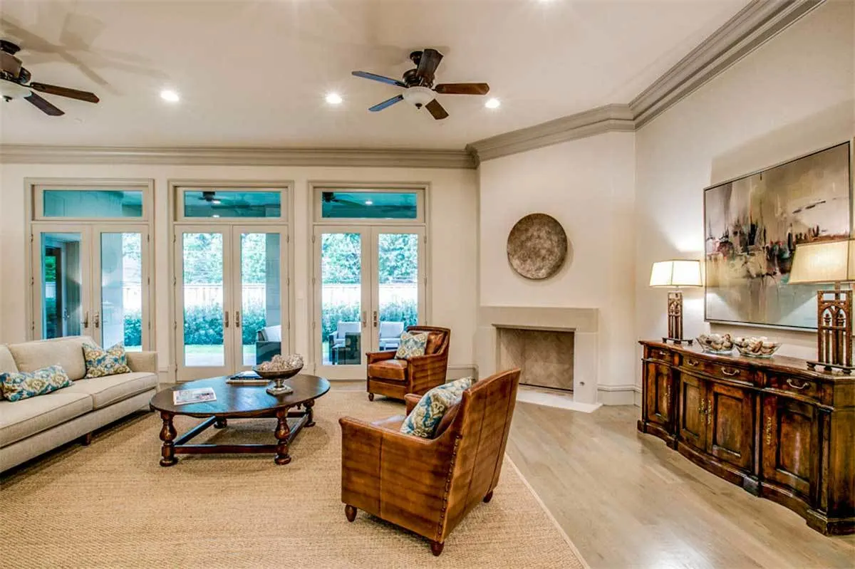 A three-door layout with a wood and glass frame allowing access to the outdoor living space.