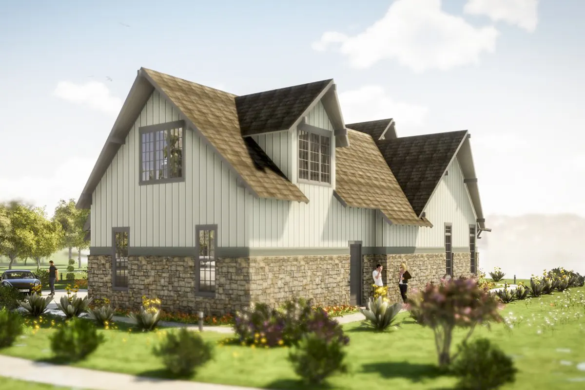 Landscaped yard on the right side of the home with visible gable overhang roof.