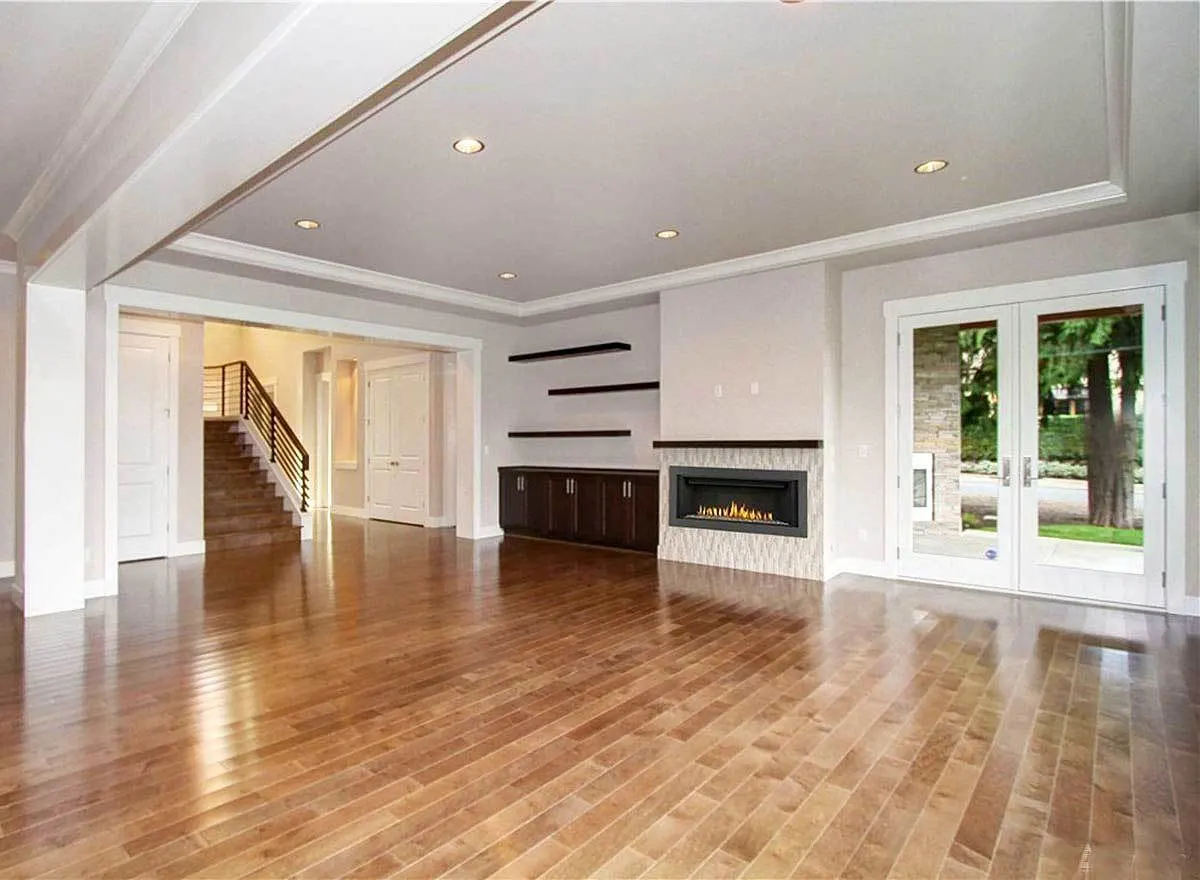 Another angle from the living area revealing the staircase and the glass door on the side.