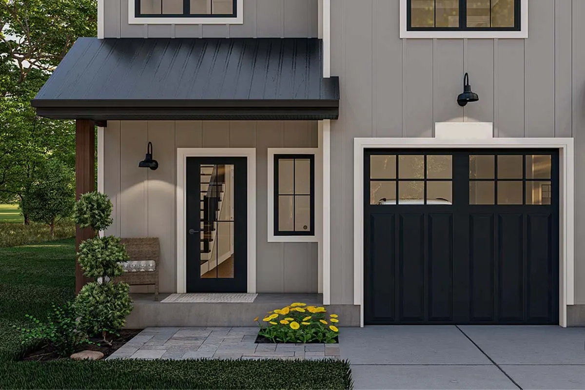 A welcoming porch with a bench and a stylish entrance and window with white trim.