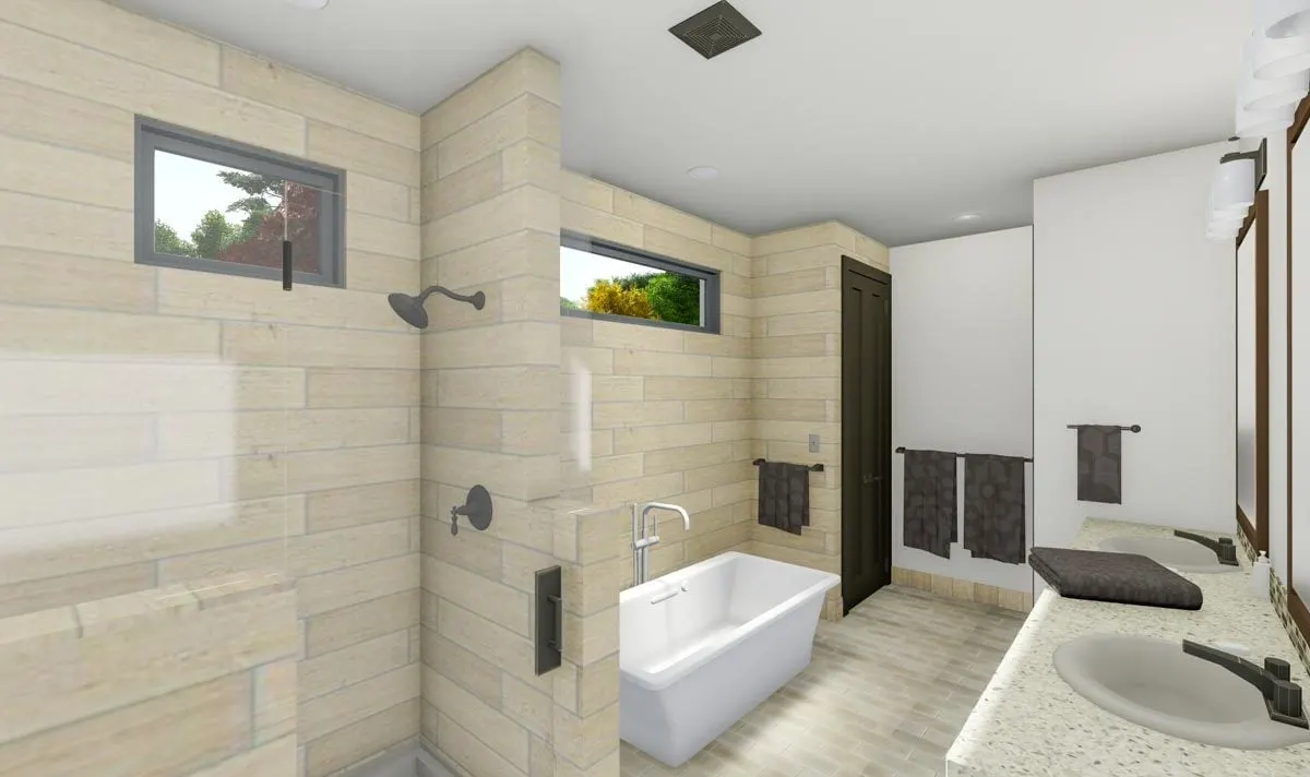 Bathroom with neutral colors with shower, tub, and vanities.