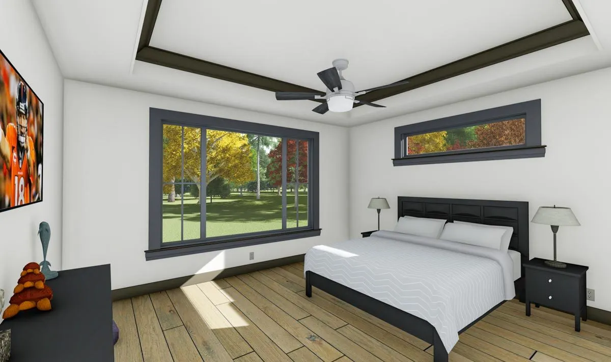 A bedroom with gray accents and a lovely window arrangement.