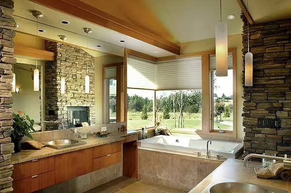 Modern bathroom with a neutral color scheme with a spa function.