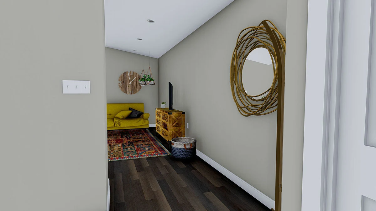 View of the great room area from the stairwell in the hallway.