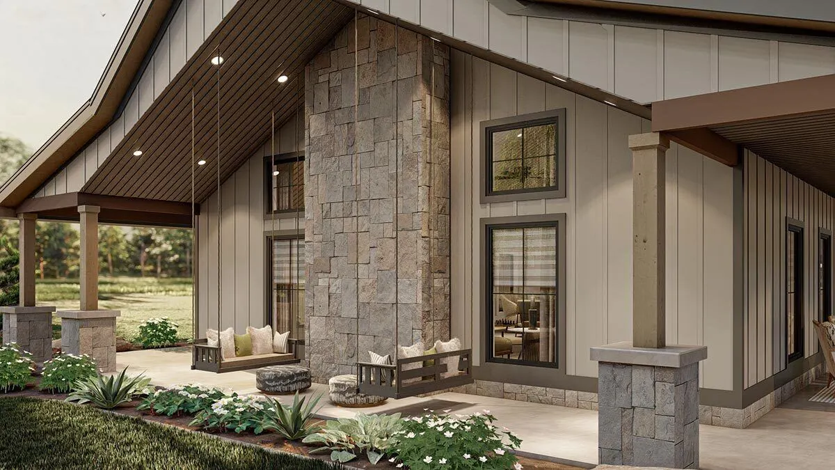 Swing chairs are installed in a neutral hue on a covered patio.