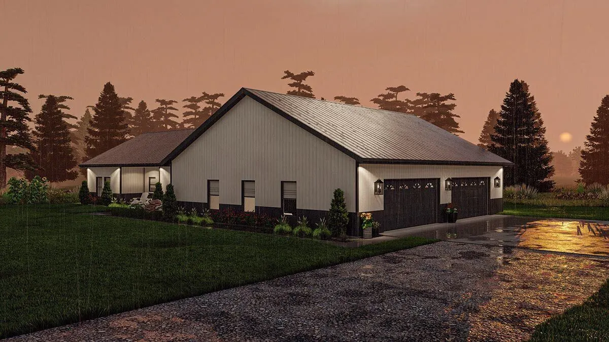 The garage area has a stone driveway.