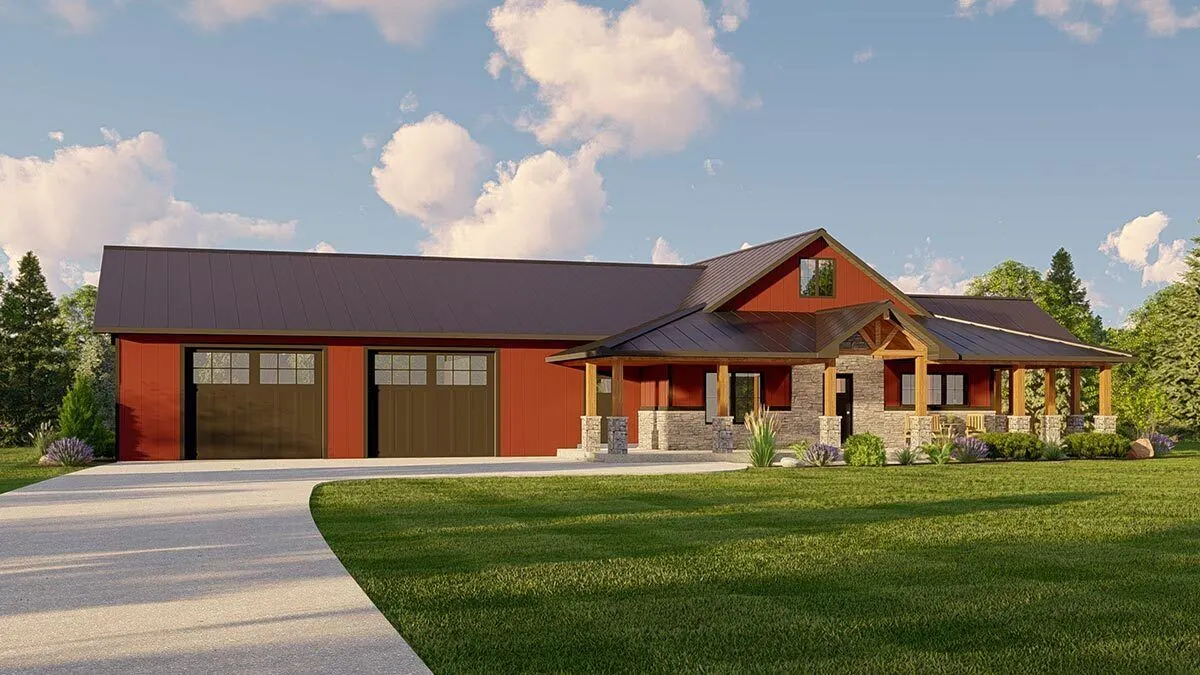 Garage area with a wide-style driveway and yard.