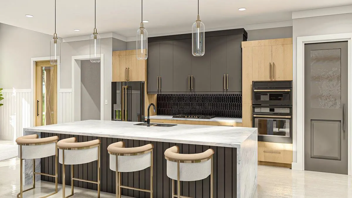 Modern kitchen design with white marble counter island.