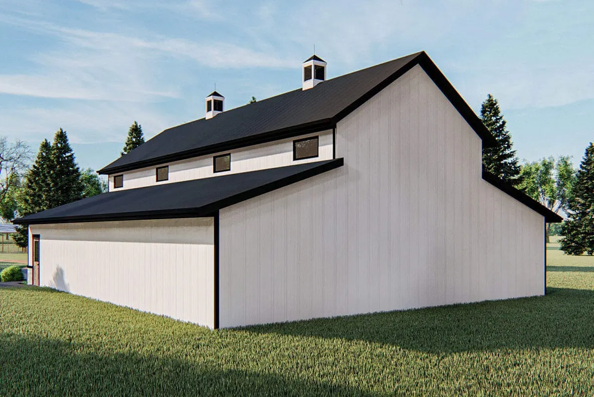 Plain white walls may be seen in the rear perspective of the pole barn garage.