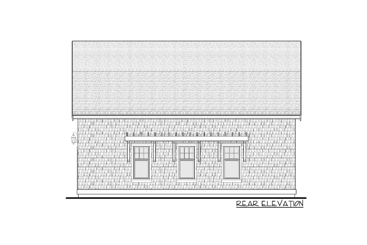 Drawing shows the single-story, two-car barndominium below the garage's rear elevation.