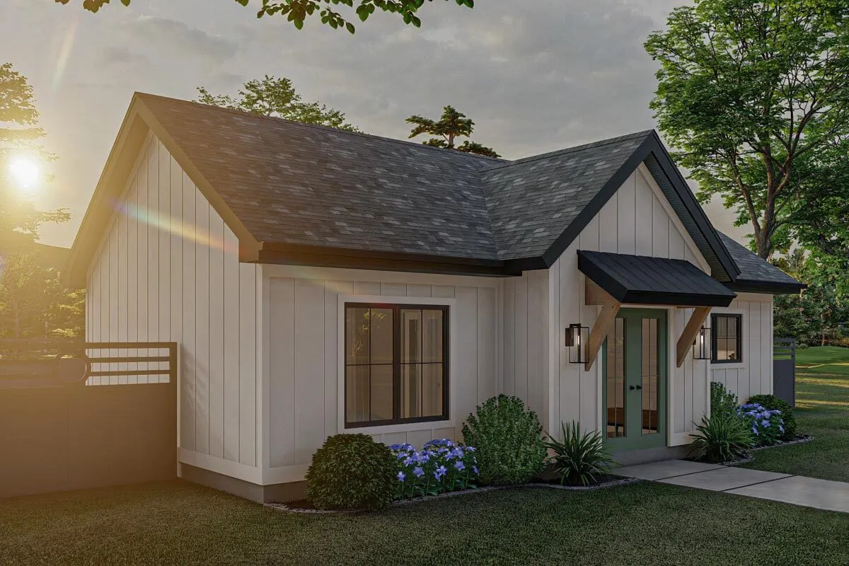 The left side of the house with gate fence in gray color paint.
