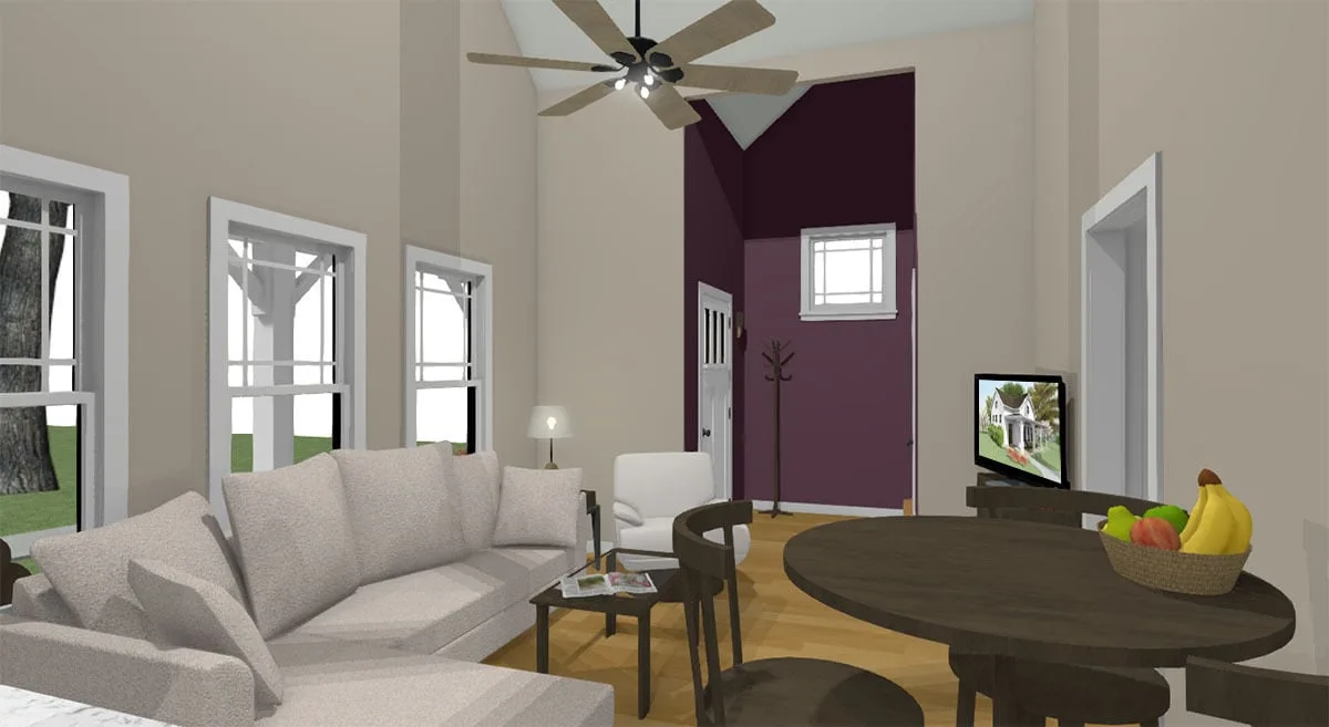 A comfortable living room space with a dark violet main entrance accent wall.