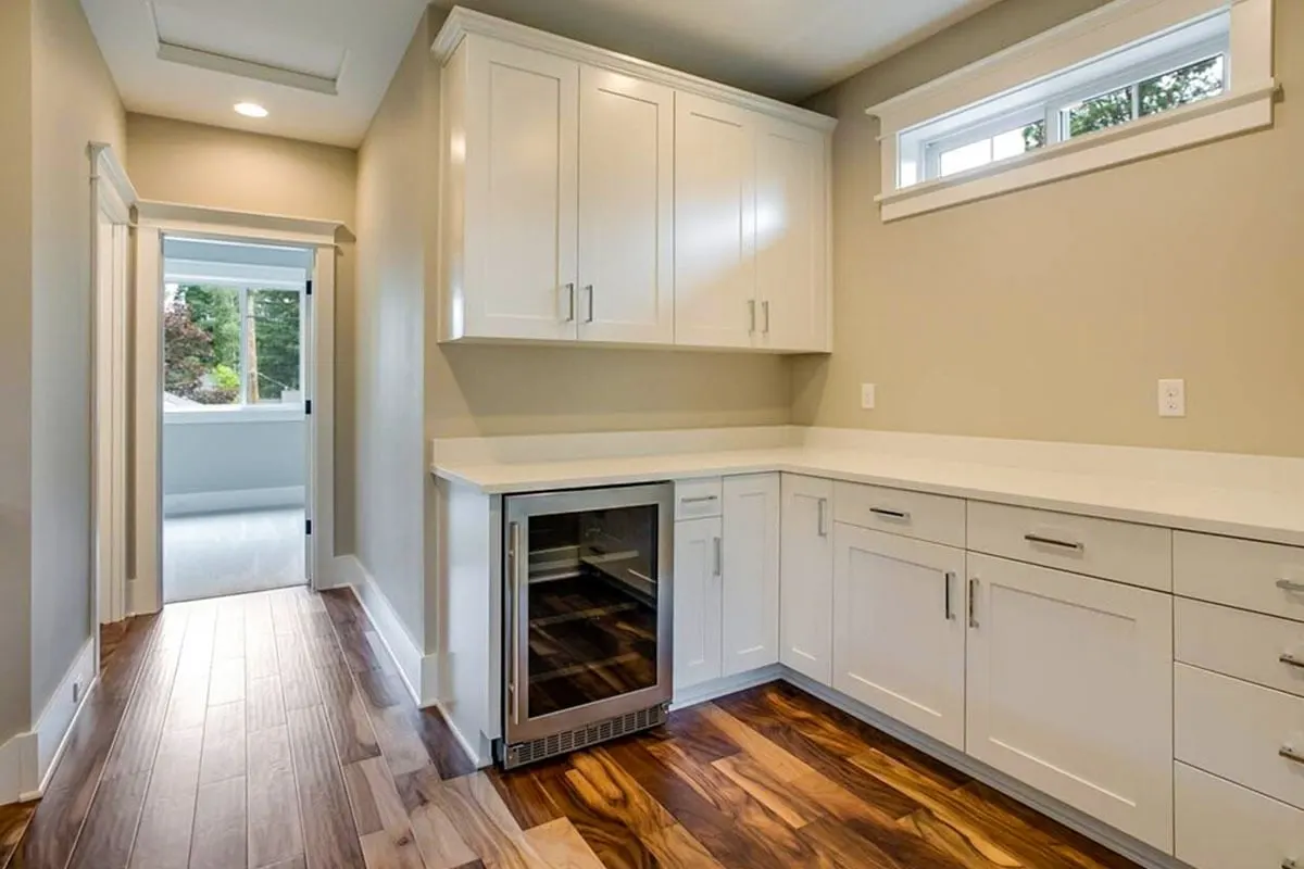 Snack area at the third level with a mini ref and spacious counter.