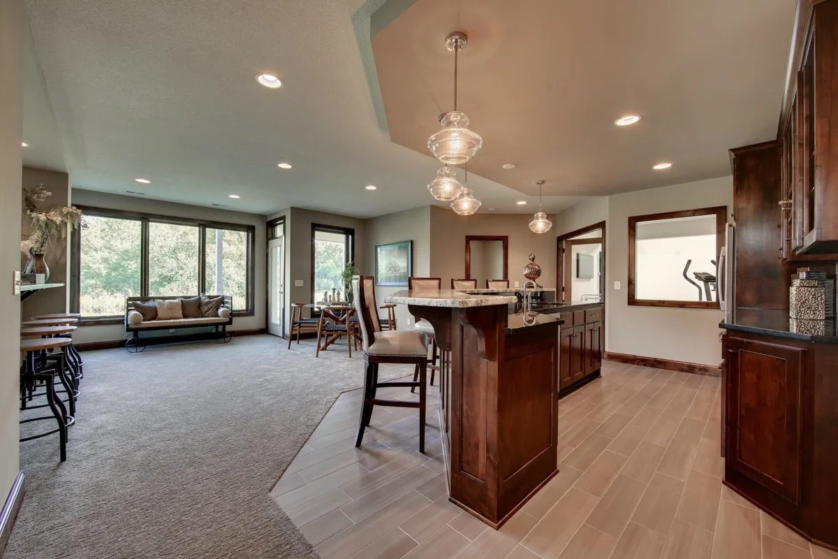 The bar area has a tile floor and a tray ceiling arrangement.
