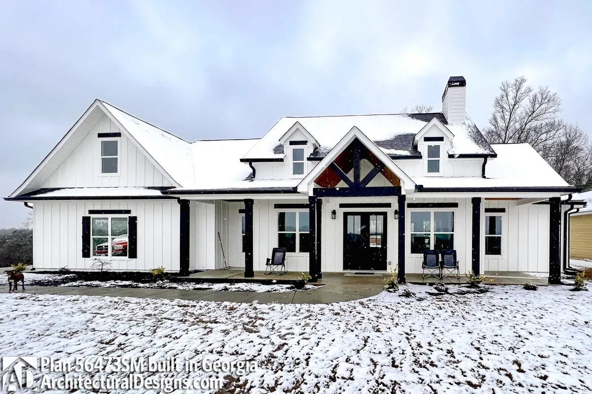 An image of a New American home in black and white with a winter environment.