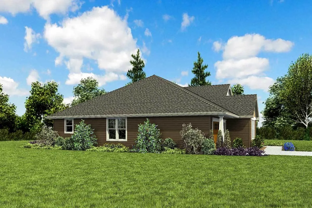Left side view of the house in wood horizontal siding layout.