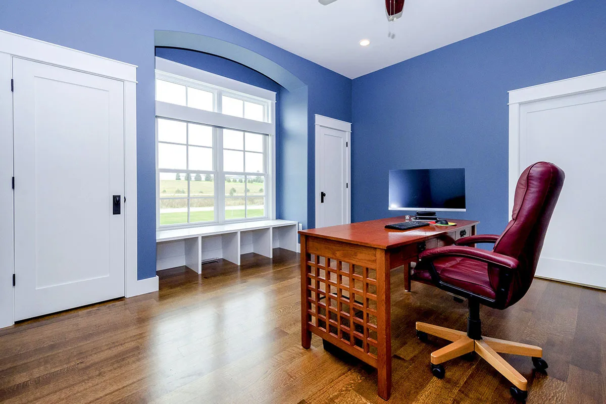 Office space with blue and white accent walls.
