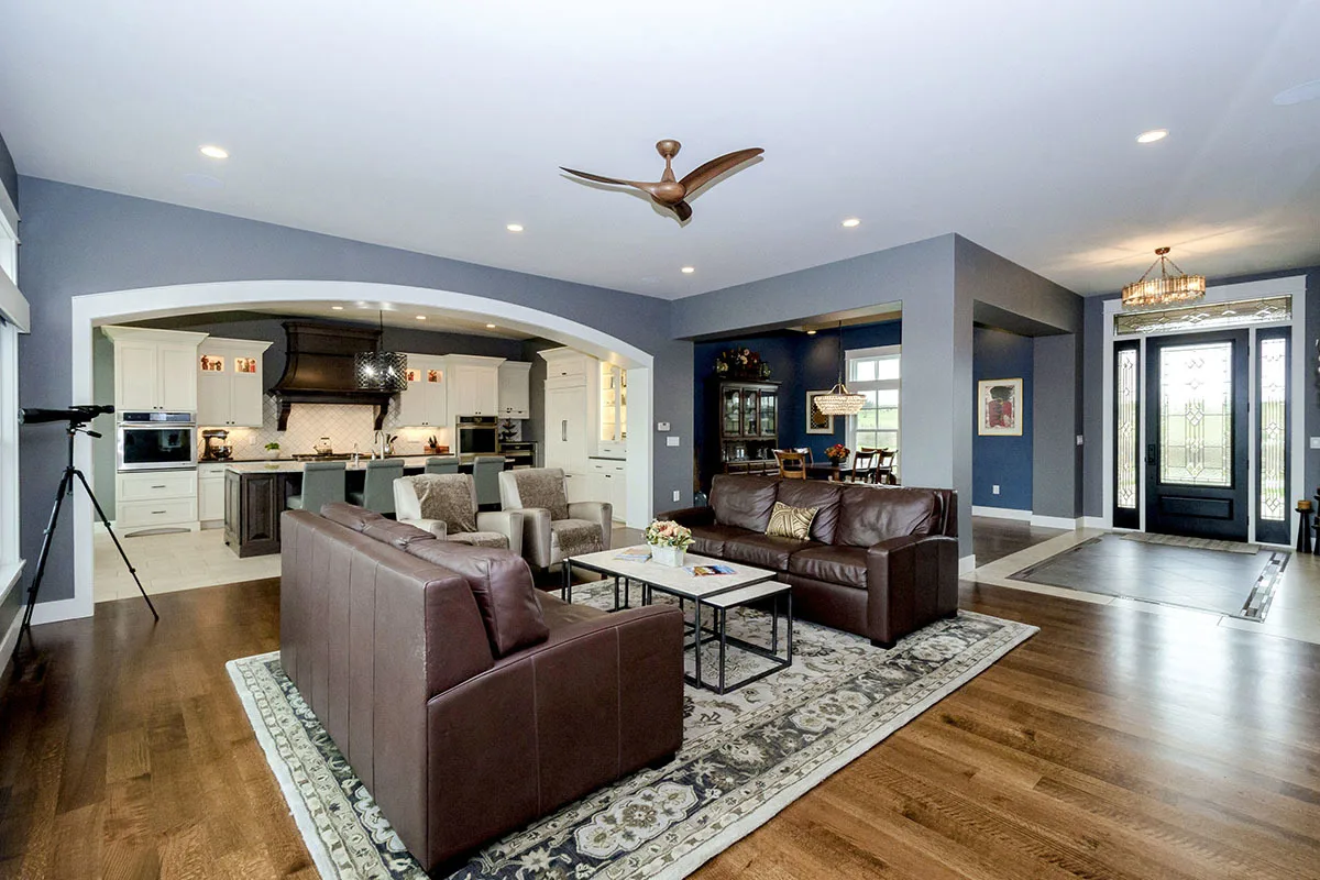 The interior with the front entry of the house in black door glass elegant accent style.